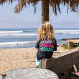 Fun Day Surf Aloha Youth Tee in Navy worn at the beach, lifestyle view