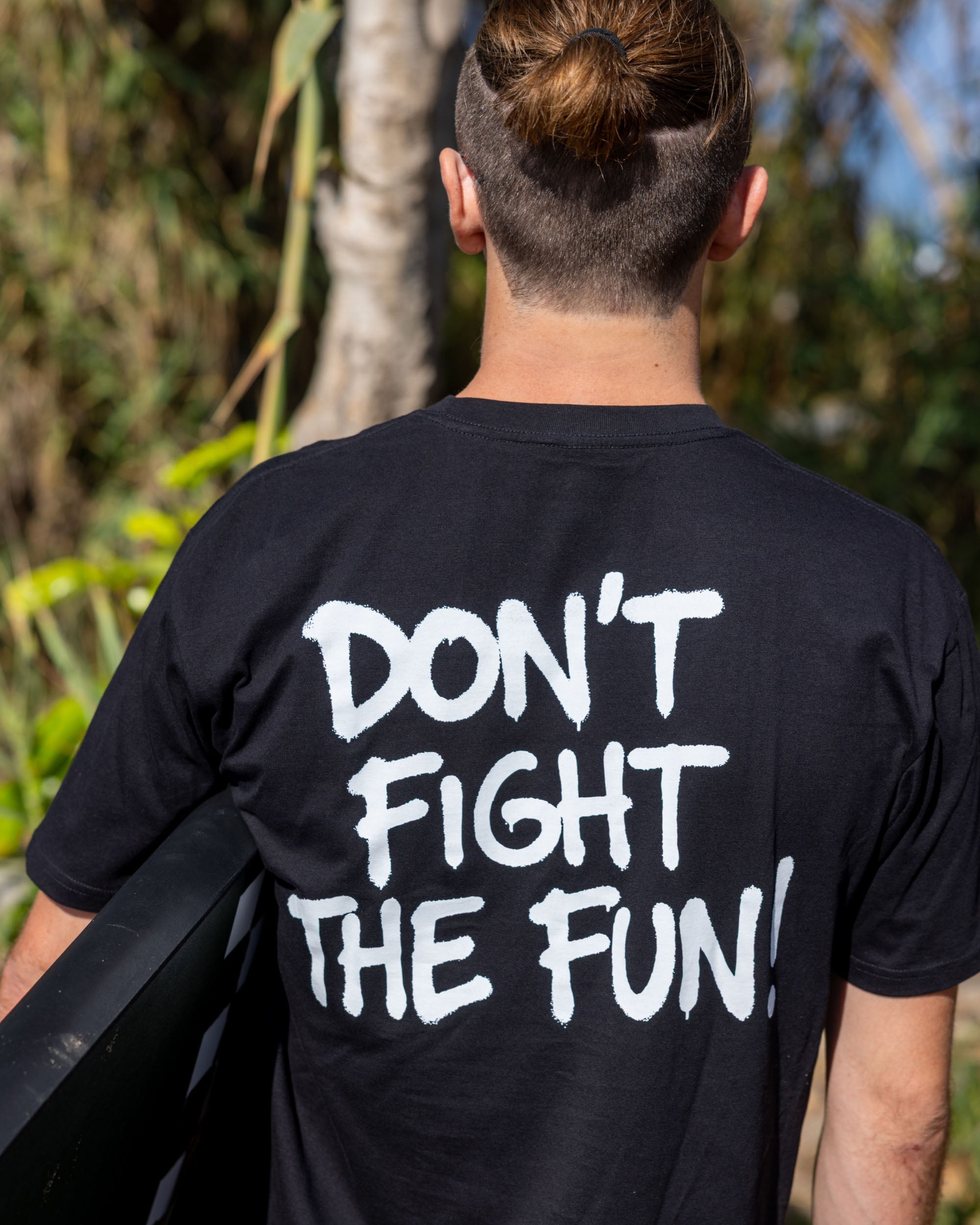 Fun Day Surf DFTF Tee in Black back graphic close-up, lifestyle view