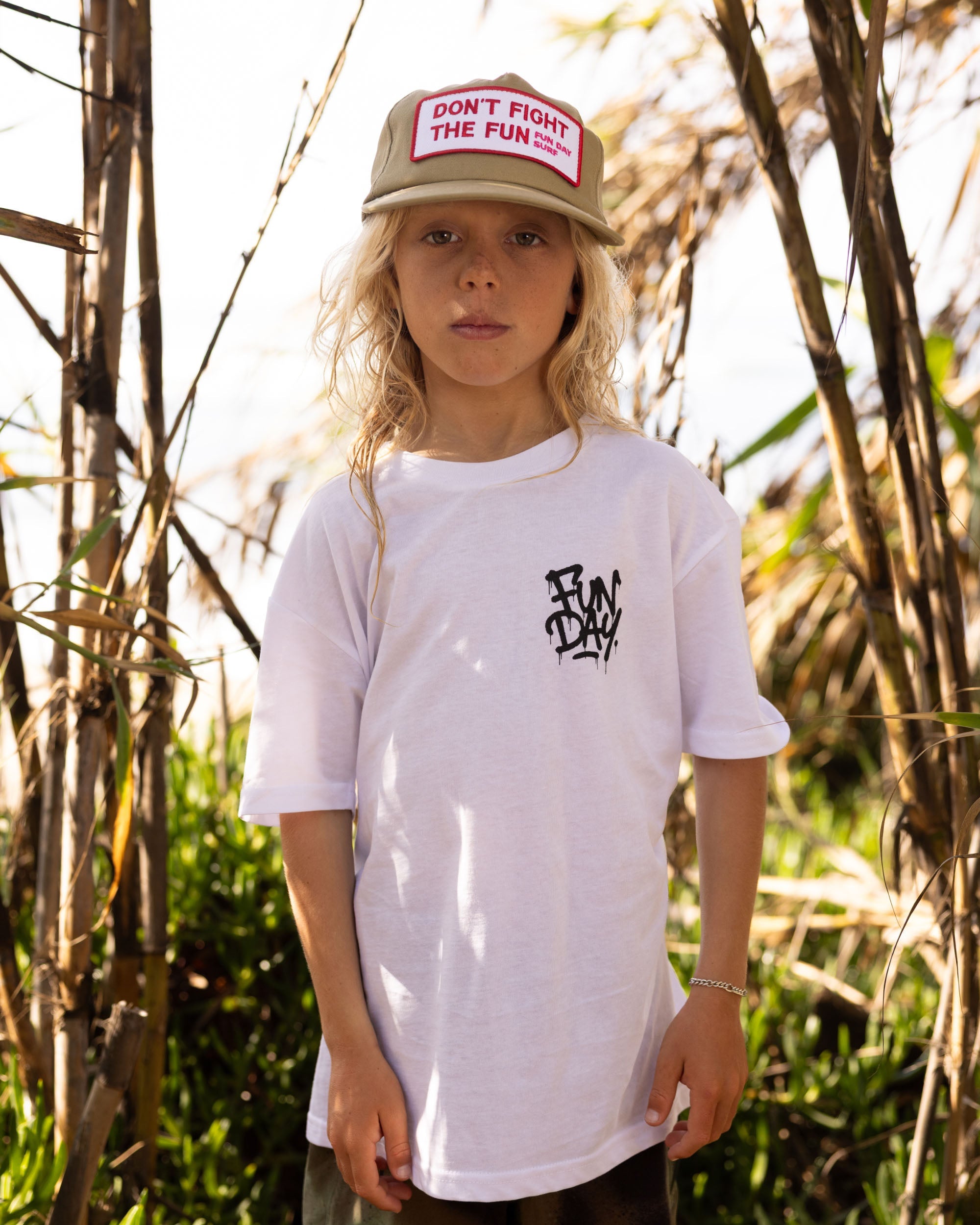Fun Day Surf DFTF Youth Tee in White worn under the palms, lifestyle view