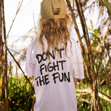 Fun Day Surf DFTF Youth Tee in White back graphic worn under the palms, lifestyle view