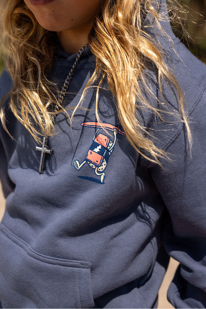 Fun Day Surf Musubi Youth Hoodie in Steel Blue chest print close-up, lifestyle view